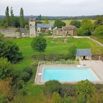 Three houses, land and ruins of a chateau