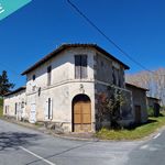 Ensemble Immobilier comprenant, deux maisons, deux garages, un terrain constructible.