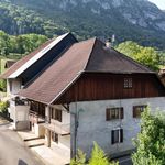 Maison à rénover avec terrasse, garage et jardin