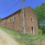 4-Bedroom Rural House in Central Portugal with Expansive Land and Investment Potential