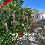 Maison de plain-pied avec dépendance proche gare et commerces.