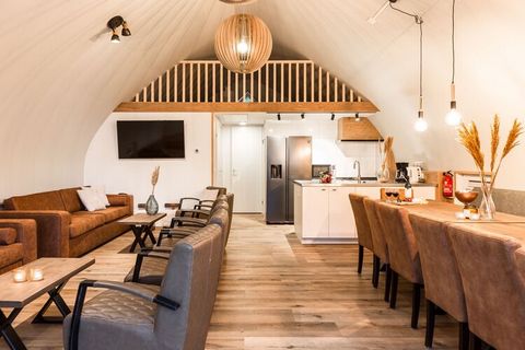 This tasteful group accommodation consists of two separate, thatched homes. This way, the living area has been fitted with a beautiful, long table and pleasant seating corners with comfortable furniture. The open plan kitchen helps you to stay in tou...
