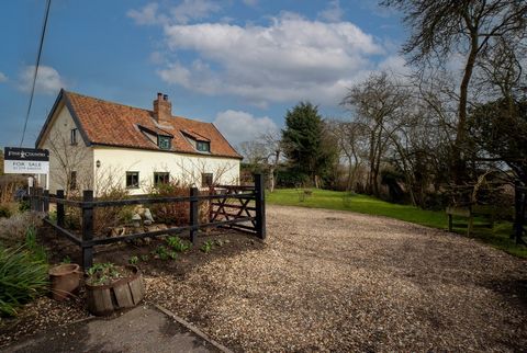 Charming Country Cottage. This wonderful Grade II listed property has everything you could need in a family home. From the four comfortable bedrooms to the excellent conservatory, every inch of this house stands out as superb. It’s a home that combin...