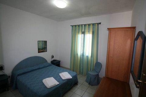 The apartments are very simply furnished and all have their own terrace with garden furniture to enjoy. In the kitchen of this apartment there is a 3 element electric hob. The two-room apartments can be booked for 2 people (IT72017-12), 3 people (IT7...