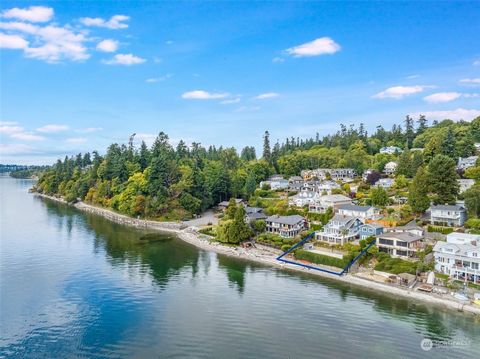 Waterfront living awaits: impeccable, well-appointed craftsman home on the Puget Sound in the coveted Woodmont Community. Walls of windows and incredible views from every level. Open and airy main floor with exquisite kitchen; french doors to welcome...
