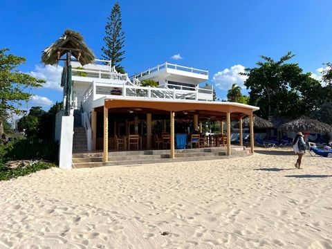 1 Bed 1 Bath upper level garden apartment in a small Boutique Hotel with 15 Units on the world renown 7 mile beach. The apartment is accessed by a concrete spiral staircase unto a 270 Sq Ft (8ft 6 inch X 31ft 6 inch) private balcony. From the balcony...