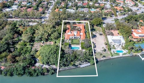 Nestled on a sprawling 1.3-acre waterfront lot, this magnificent Miami Beach property offers endless possibilities. Featuring 6 spacious bedrooms. 7.5 bathrooms, 40 ft dock and 3 car garage, , this home boasts over 12,359 total square feet of living ...