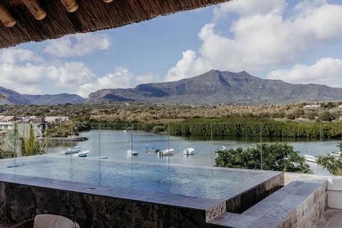 GADAIT International offers you a sumptuous 366 m² penthouse for sale in Rivière Noire, boasting a private pool, breathtaking views and located close to the beaches. Become the owner of this jewel of a property offering breathtaking views of the mari...