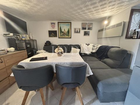 Location: Primorsko-goranska županija, Crikvenica, Selce. Apartment for sale in Selce, with a total area of 34.21 m², spread over two floors and featuring a private external entrance. The ground floor includes a kitchen with a living room and a bathr...