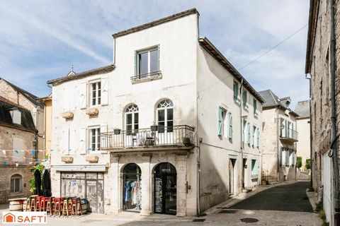 Batisse avec appartement et local commercial
