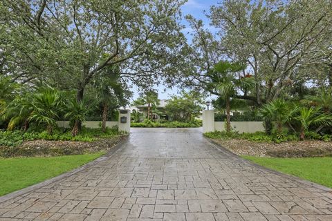 Tropical Oasis Country Living at its finest, this home has it all. Oversized bedrooms all with ensuite bathrooms and walk-in closets with custom built in drawers and shelving. Separate office/ guest bedroom with ensuite bathroom. Great room/ game roo...