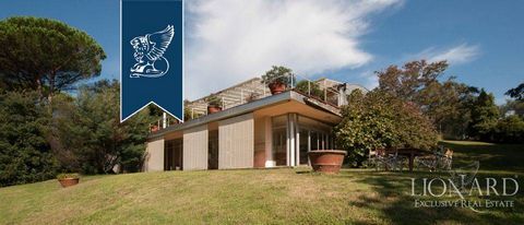 Luxury villa for sale positioned on top of a hill, west to the city of Lucca. The house is a modern building of refined, elegant architecture, simple and linear, in spite of its very large dimensions. The vast and bright main hall opens to the outsid...