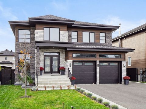 Superb contemporary style two-storey house, double garage with epoxy floor, located in a crescent without a dead end, in the heart of Mascouche (Mascouche Heights sector), in a very sought-after and family-friendly neighborhood. Prestigious property ...