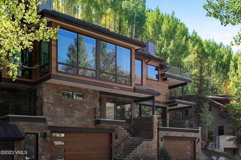 Rare opportunity to own a new construction, Mountain Modern Contemporary home on the coveted Forest Road. Luxury Vail home that is a true private ski-in home from the Simba ski run, and just steps to the slopes. A prime location nestled in the mounta...