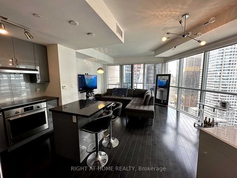 Gorgeous 2 Bedrooms + 2 Full Bathrooms Corner Unit Available In A Prime Location. * High Ceilings With Large Windows. * Walking Distance To Union Station, St Lawrence Market, Scotiabank Arena, Rogers Center, Restaurants, And Much More. *Unit Is Tenan...
