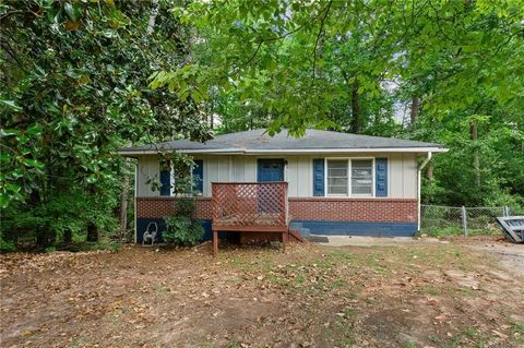 Great ranch home on a double lot in a prime location! Ample off-street parking leads to a front porch. The updated interior includes hardwood floors, neutral paint, and ceiling fans in the bedrooms. The kitchen features white cabinets and laminate co...