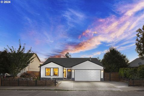 Welcome home to this gem (91 bike score) located in the heart of Lents with convenient access to I205/26! A tranquil water feature welcomes your arrival to a turnkey 3 bed & 2 full bath single story ranch fully remodeled including an open layout, des...