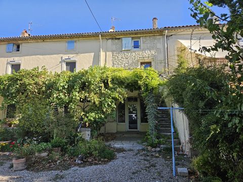 Exclusive: Part of the farmhouse adjoining on 2 sides. This building with stone façade is on 2 floors. On the ground floor: living room, kitchen, toilet; on the 1st floor: bedroom, shower room; On the 2nd floor: office and bedroom. This property of a...