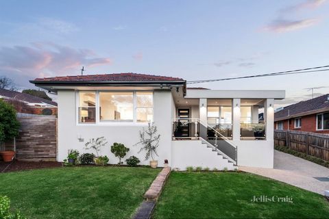 Beautifully renovated to capture the light filled open plan design, this ultra stylish home revels in its high side position with blissful city views. Rendered with feature wall sconces that delicately add a warm light to the façade, the high-set hom...