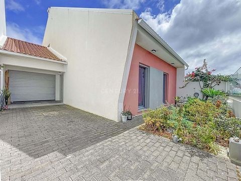 This modern and spacious 5-bedroom home, located in the 