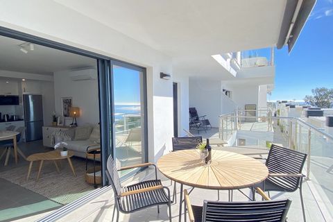A modern apartment offering a serene coastal retreat, this holiday home features two sea-facing bedrooms, each with a double bed, and accommodates up to four guests. It includes two bathrooms with showers and a spacious private terrace equipped with ...