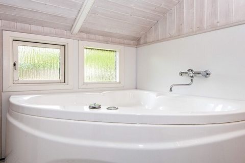 Not far away form the big dune of Hvidbjerg you will find this holiday cottage in a secluded and child-friendly area. There are two terraces so you can enjoy both the morning and the evening sun. From the living room you enter directly to one of the ...