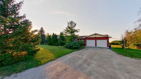 Duplex Ranch Style Bungalow 2 Bedrooms & 2 Washrooms On 1 Acre Of Land, Very Spacious. Front Portion Of A Duplex Property Is Available For Rent. 1 Garage & 3 Parking Outside. Huge Front Yard/Garden. Very Quiet Area, Country Setting, Beautiful Country...