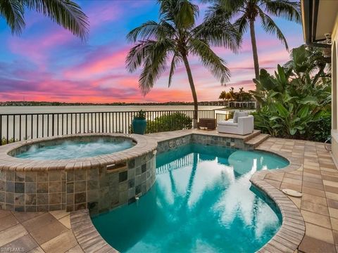Welcome to your beachfront dream home in prestigious Miromar Lakes Golf & Country Club, nestled within the Costa Amalfi community. This stunning property has wide water views and boasts 4 bedrooms, ensuring ample space for family or guests. Step into...