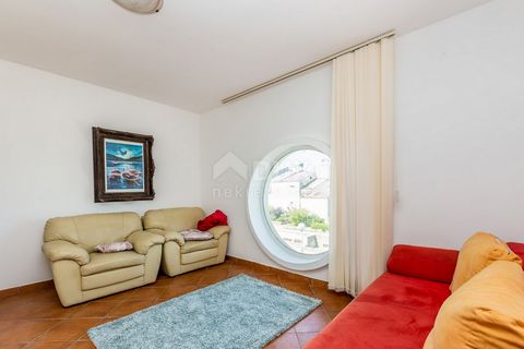 Location: Primorsko-goranska županija, Omišalj, Njivice. ISLAND OF KRK, NJVICE - Newly renovated apartment with sea view that can be used as a whole or divided into two or three separate apartments! The ground floor has its own entrance, entrance are...