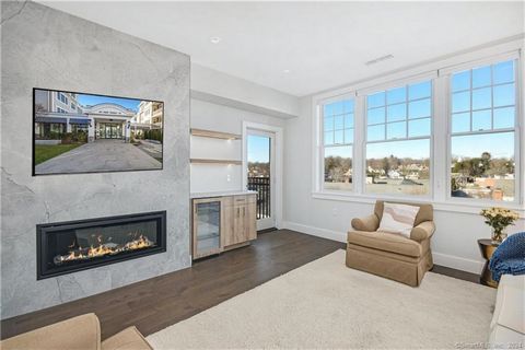 Newly listed high floor sunny 2BD/2BTH condo with open town views! Experience sophisticated single-level living at the VUE, an exciting premier luxury condominium community in the heart of New Canaan. The condo features fine interior finishes and arc...