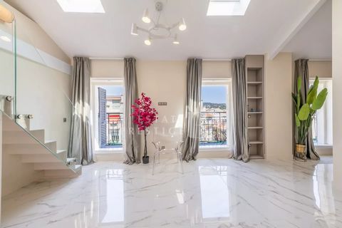 Magnificent apartment of approximately 100 m² located in the heart of Carré d’Or, in a bourgeois palace with an elevator. It features a large balcony offering an unobstructed view of the hills of Nice. The living room with a fully equipped open kitch...