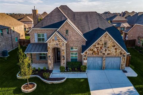 GORGEOUS home located in Somerset Village at The Tribute, a Lakeside resort and Golf course community. This home is bright and beautiful w an abundance of windows surrounding each room of the home. From the minute you walk in, you're greeted by a wra...