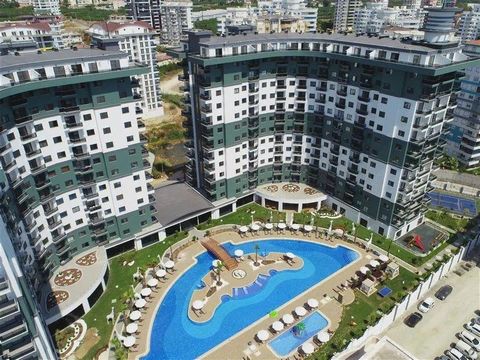 ALANYA/MAHMUTLAR HOTELLKONCEPT 1+1,55 m2 FULLT MÖBLERAD UTOMHUSPOOL-INOMHUSPOOL-FITNESS-BASTU-TURKISKT BAD-ÅNGBASTU-7/24 SÄKERHET-RECEPTION-MARKNAD-RESTAURANG-LEKPLATS-GENERATOR-PARKERINGSPLATS-BBQ-FOTBOLL OCH TENNISOMRÅDE KONTAKTA OSS FÖR MER INFORM...