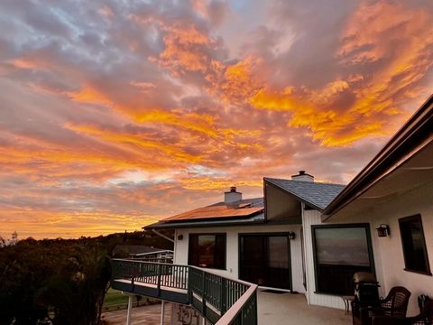 Enjoy the breathtaking bi-costal views from the spacious 825 sq. ft. deck of this exquisite Kula property. The primary residence spans 2,885 sq. ft. and features vaulted ceilings, custom cabinets, and a charming stone fireplace. Downstairs offers an ...