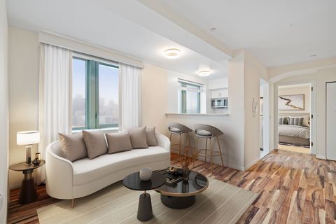 Step into the embrace of luxury with this inviting 2-bedroom, 2-bathroom residence nestled in the heart of vibrant East Harlem. Your corner sanctuary boasts an abundance of natural light, courtesy of six expansive windows facing North and West, illum...