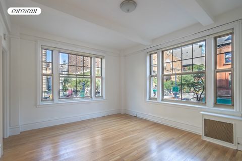 Beautiful, sun-drenched one-bedroom corner apartment in a doorman building on a prime Upper West Side block. This dramatic space has huge windows with commanding views of Amsterdam Avenue, 74th Street, and beyond. High beamed ceilings, large rooms, a...