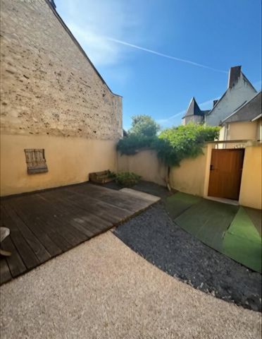 Une maison qui raconte une histoire, à deux pas des commodités