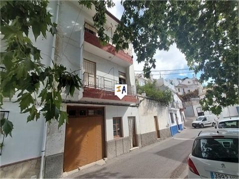 Situated in the typical Spanish village of Tozar in the province of Granada in Andalucia, Spain, is this 212m2 build 4 bedroom townhouse with a garage and outside space to renovate. Located on a quiet, wide, level street with on road parking right ou...