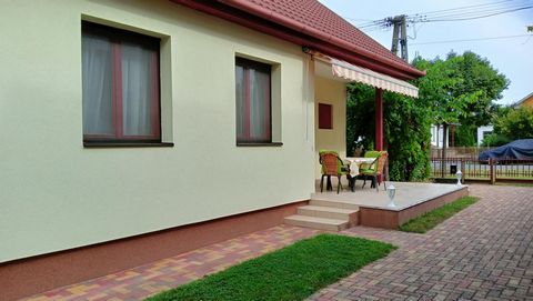 This apartment house is located only 800 meters away from the Balaton Lake, on a quiet street, far from the traffic noise. The big house is suitable for 10 people, it has 2 floors and also a big garden. You can reach everything within minutes walk fr...