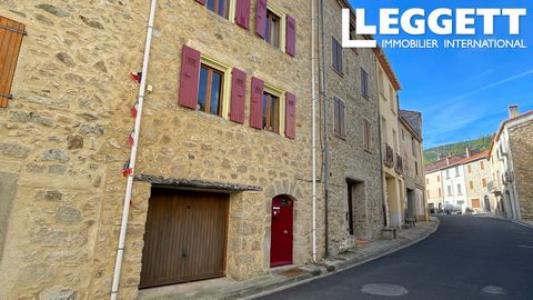 A24485CTG66 - Stone-built village property over 4 floors with garage/workshop in the centre of the historic village of Corsavy, providing spacious living areas and access to a terrace on the castle ruins with panoramic views. Information about risks ...