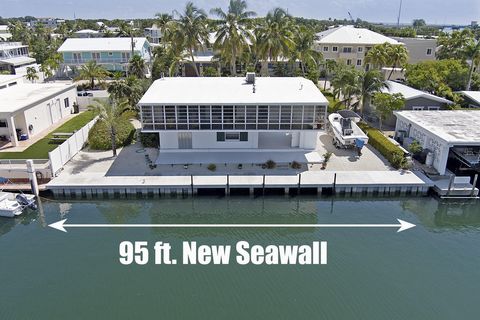 Venetian Shores 3/3 all concrete home with 95 ft. of deep-water dockage and a new seawall in Islamorada's premier boating community. Enjoy near instant access to both the Atlantic Ocean and Florida Bay via Snake Creek with a drawbridge on the ocean s...