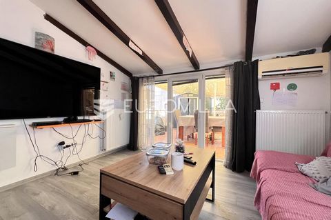 For sale is a beautiful and functional three-room apartment located on the ground floor of a smaller residential building with only a few apartments. It has a total area of 64.30 m2 and consists of an entrance hall, a bathroom, two bedrooms, a living...