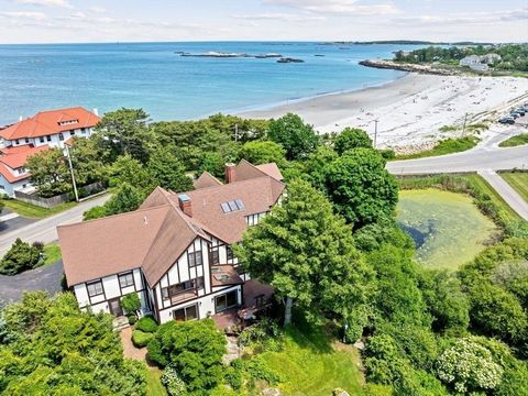 Magnificent home perched high along the Gold Coast with views of the ocean walking distance to Sandy Beach. This stately home is an architectural masterpiece with exquisitely crafted details featuring period moldings, wainscoting and gorgeous antique...