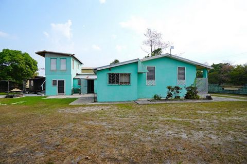 Discover an exceptional opportunity in Burrell Boom, Belize, with this expansive 5-bedroom, 4-bathroom home, nestled on a generous 1/4-acre lot. Positioned in a prime location, this property presents both residential and commercial potential, making ...