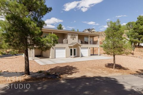 The perfect blend of comfort and convenience in a beautiful Virgin, Utah residence! Nestled in a serene neighborhood, this home boasts a modern design and immaculate interiors. Featuring multiple spacious bedrooms and living areas, and kitchens there...