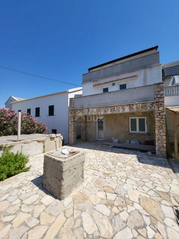 Location: Ličko-senjska županija, Novalja, Zubovići. PAG, ZUBOVIĆI - House with 4 apartments near Novalja House for sale in Zubovići on the island of Pag. The house consists of 4 apartments on three floors. The house has a beautiful terrace with a vi...