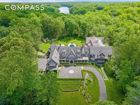 Located in the gated community of Conyers Farm, a private, lakefront country estate, ideally perched on over 10 acres. This extraordinarily chic shingle and stone residence was originally built in 2002 with enhancements and an expansion in 2017. Incl...