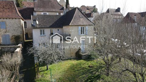 Maison de village en pierre avec jardin et garage