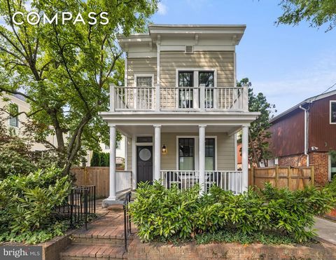 Welcome to 5212 MacArthur Blvd, built in 1900, lovingly renovated and expanded, this home is a blissful retreat in the heart of the Palisades. The inviting front porch leads to the main level, which features hardwood flooring, the living room flows t...