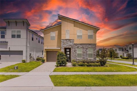 SELLER MOTIVATED. Step into resort-style comfort at 1809 Tropical Palms Circle, an 7-bedroom, 6.5-bathroom pool home located within the gated Solara Resort—a premier destination for short-term rental investments and Central Florida living near Disney...